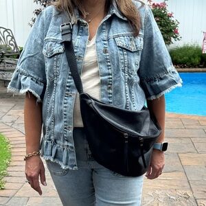 Women’s Navy Leather sling bag.